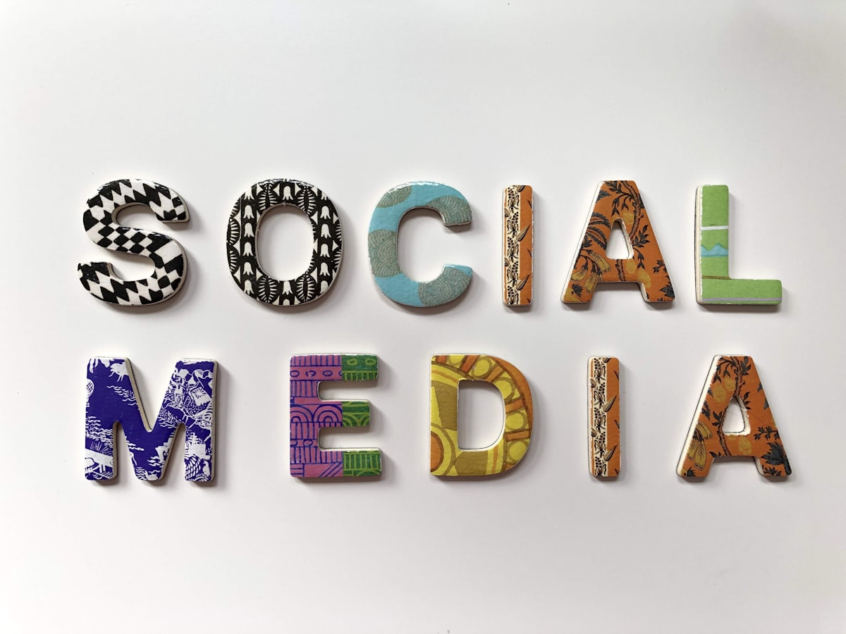 Social media marketing strategy on phone and laptop
